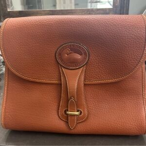 Dooney & Bourke Pebble Leather Messenger in Cognac Brown